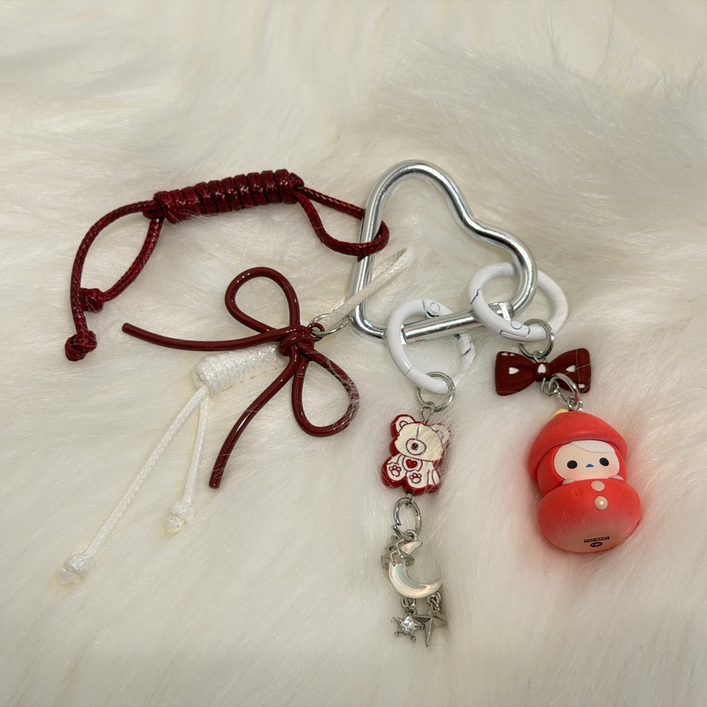 Red and White Keychain with POP Mart Pucky Charms
